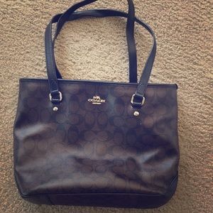 Medium size coach purse.